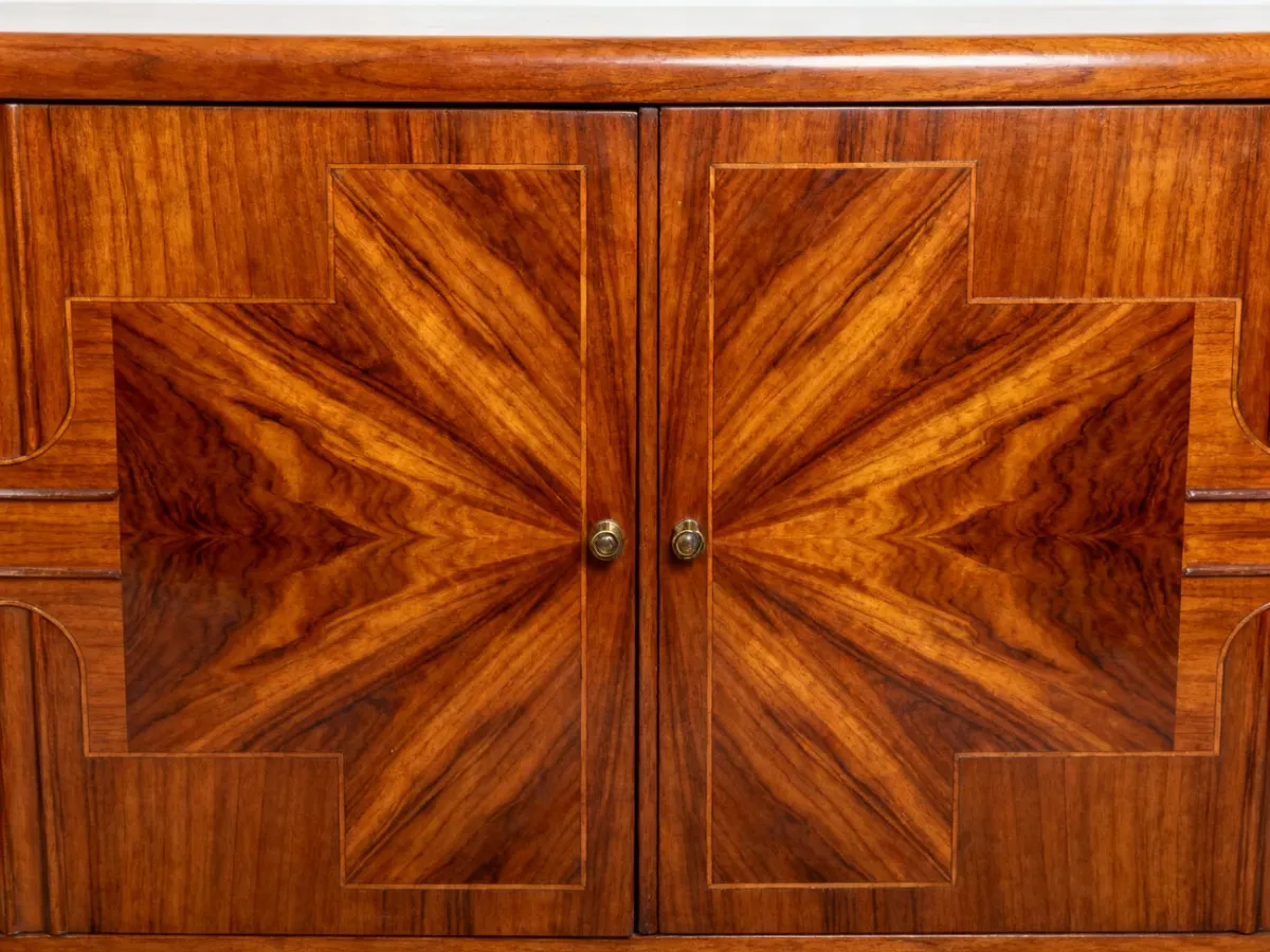 Front of an Art Deco sideboard with symmetrical book-matched walnut veneer